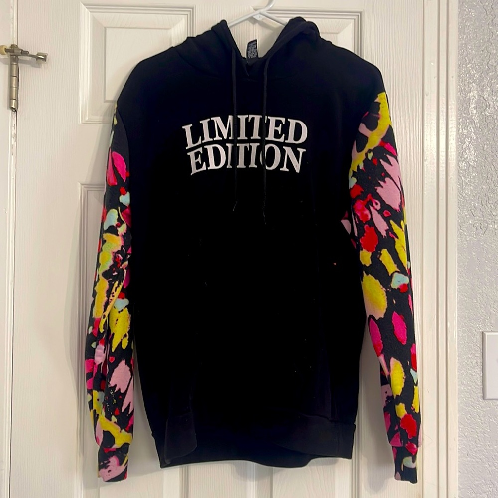 Black L hoodie that says limited edition with colorful tie dye sleeves.
